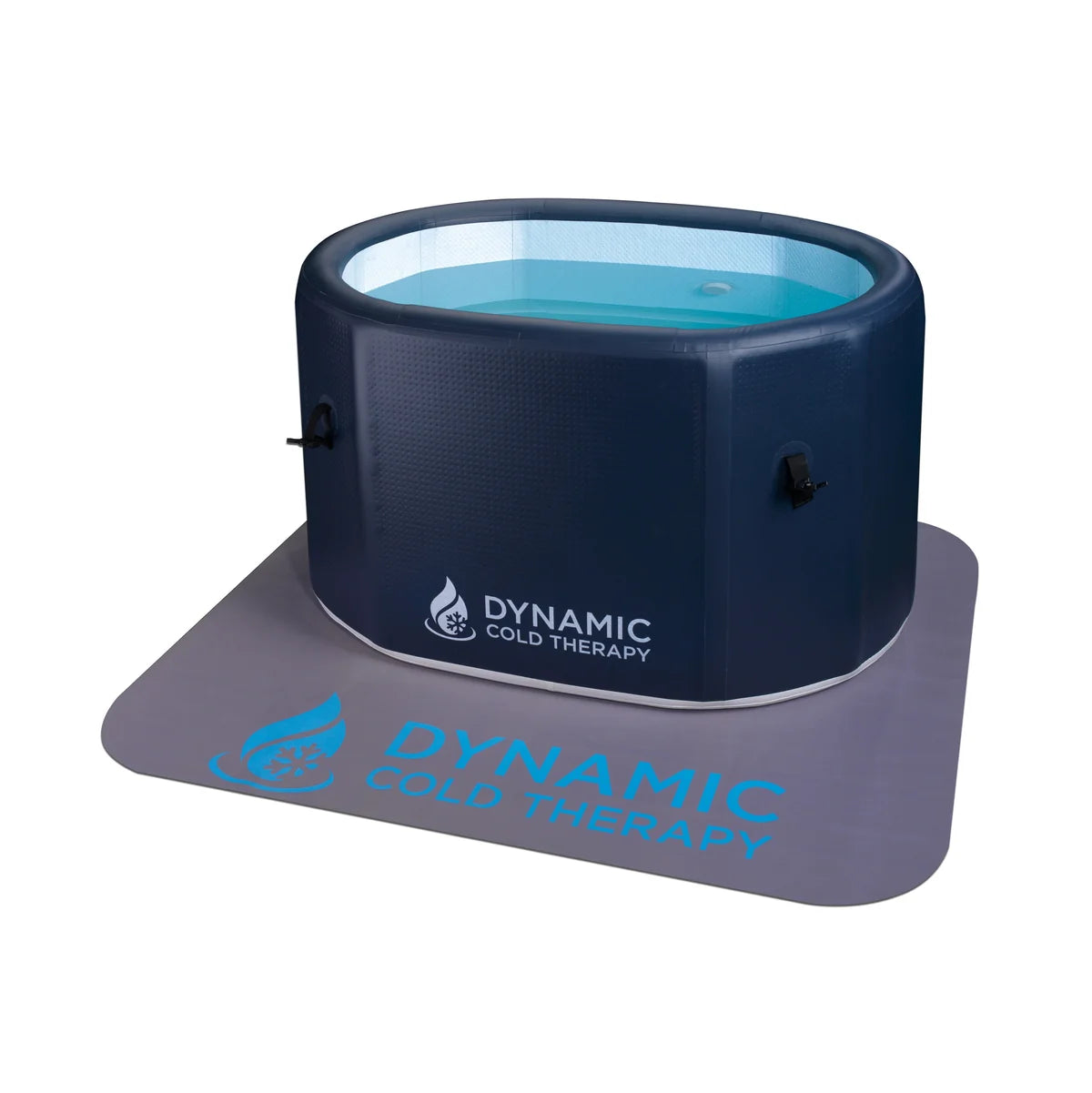 A Dynamic Cold Therapy inflatable hot tub with blue water, resting on a gray mat with the brand logo printed on it, set against a plain white background.