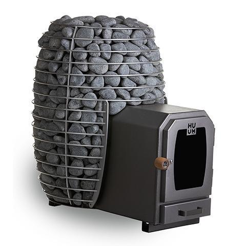 HUUM HIVE Wood Series wood-fired sauna stove in dark metal with a tall cage of gray stones and extended firebox