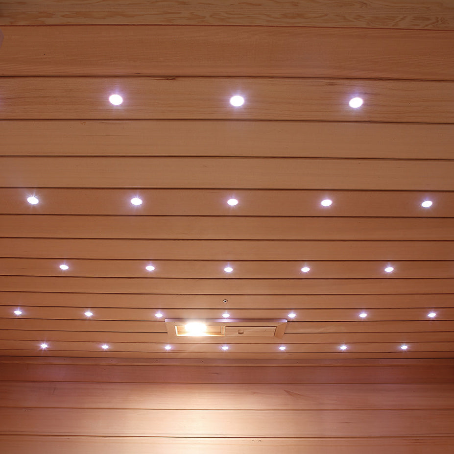 White LED lights arranged across ceiling of Canadian Hemlock sauna