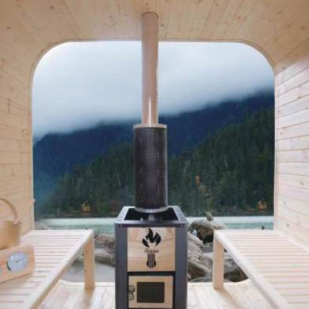 Interior of Waja Luna sauna showing wood-burning heater and scenic view through large glass front