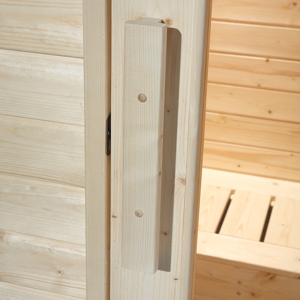 Detail of tempered glass door handle and Canadian Hemlock interior wall of Waja sauna