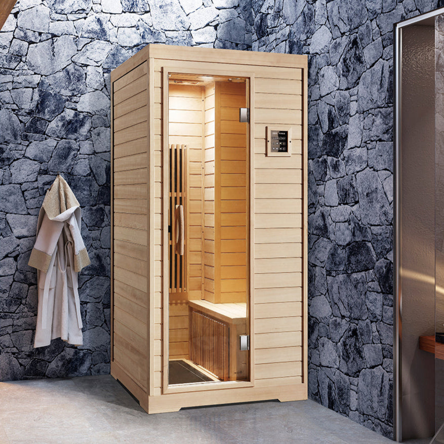 Compact Canadian Hemlock infrared sauna with tempered glass and upright design