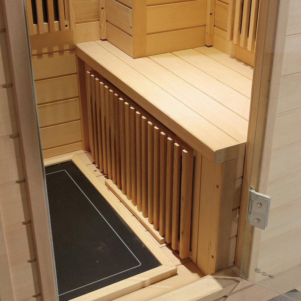 Bench and floor infrared heating panel inside compact Hemlock sauna