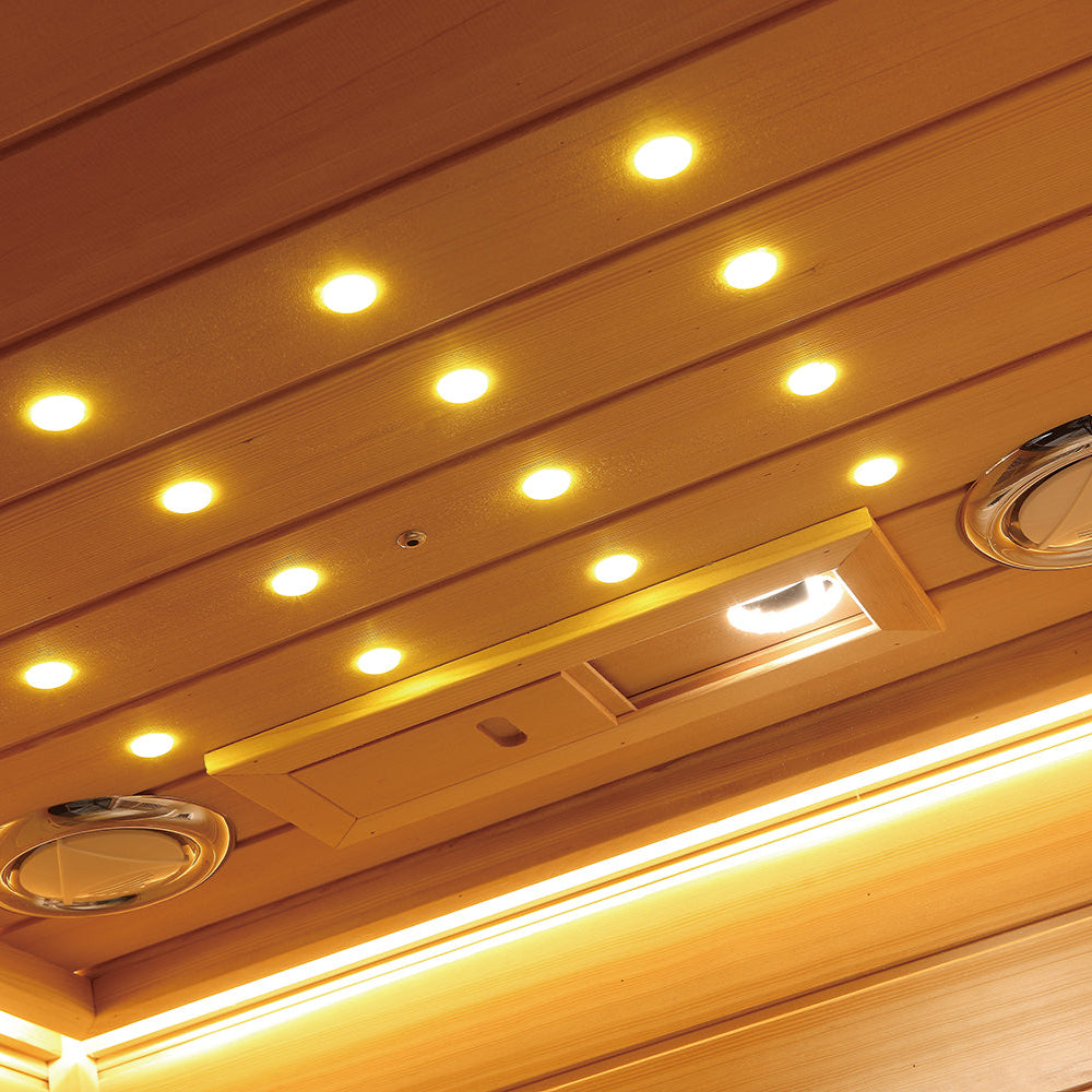 Yellow LED ceiling lights inside Waja infrared sauna cabin