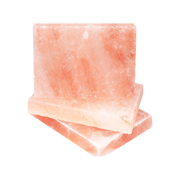 A stack of authentic Himalayan salt bricks, ideal for sauna walls and décor, offering a warm, ambient glow.