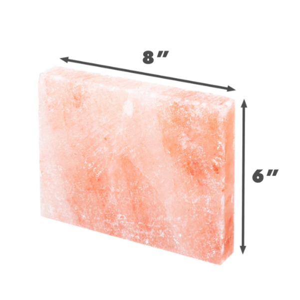 An 8-inch by 6-inch Himalayan salt brick, designed for wall-mounted or freestanding sauna installations.