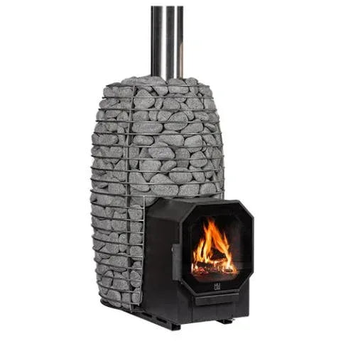 HUUM Hive Flow Wood-Burning Heater with a tall gray stone-filled steel cage, black firebox and visible flames