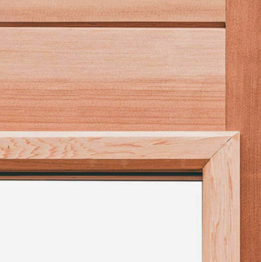 Close-up of Scandia sauna wood door frame, crafted from premium-quality wood for durability and insulation.