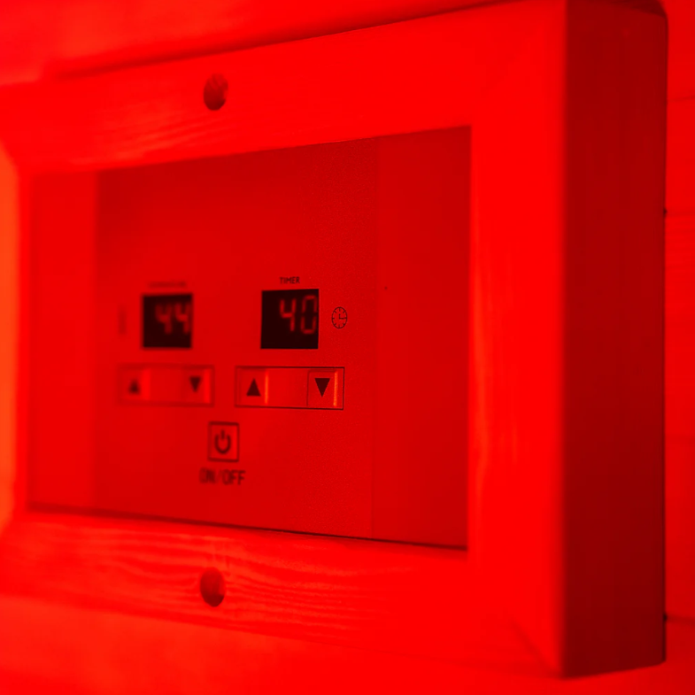 Close-up of the Sweat Box Infrared Sauna’s digital control panel, allowing precise temperature and time adjustments for a customized infrared heat therapy experience.