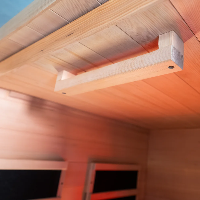 Close-up of the Sweat Box Infrared Sauna’s premium wooden handle, crafted for durability and seamless access to your personal wellness space.